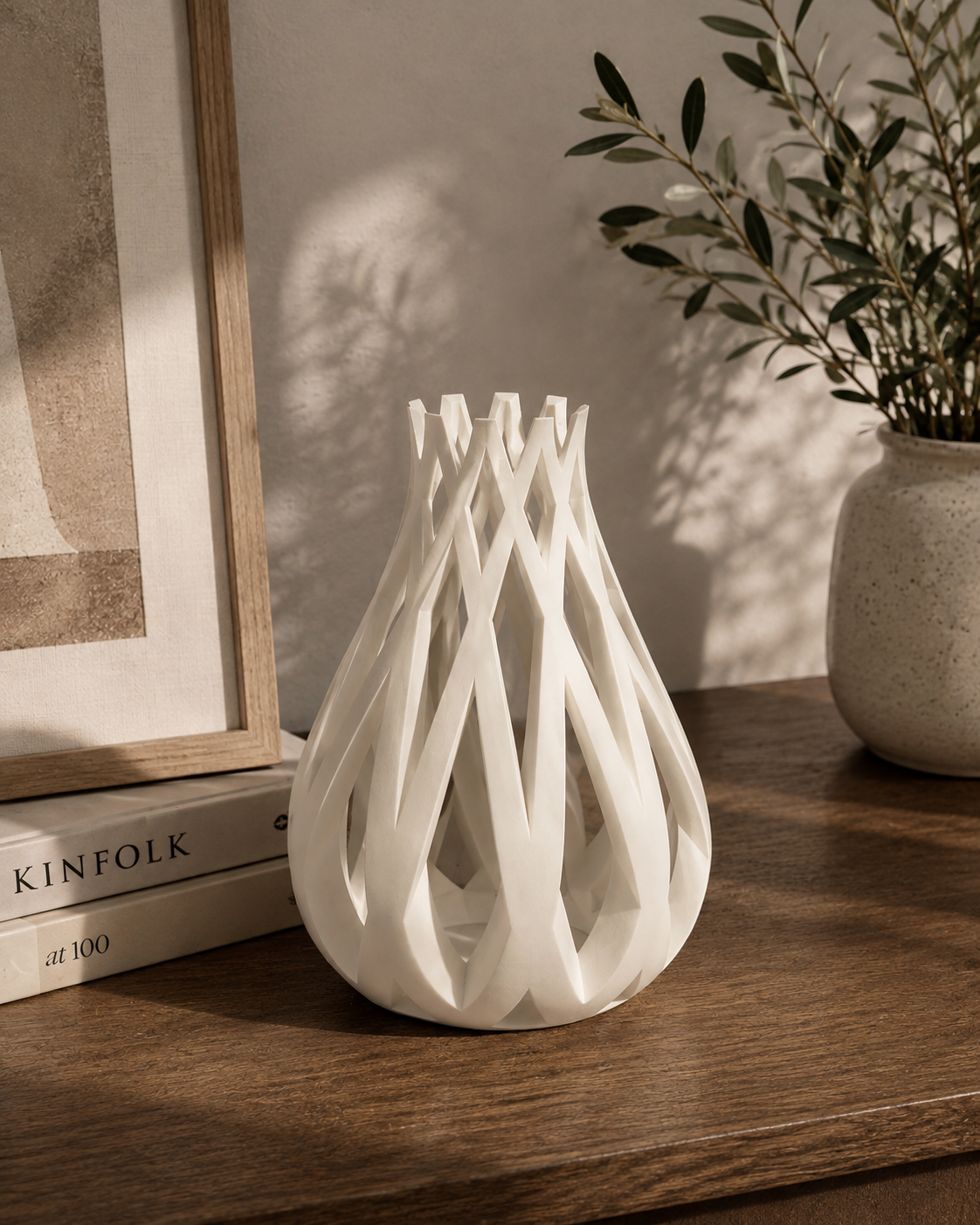 White abstract 3D printed sculpture styled on a timber console