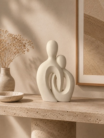 family embrace sculpture